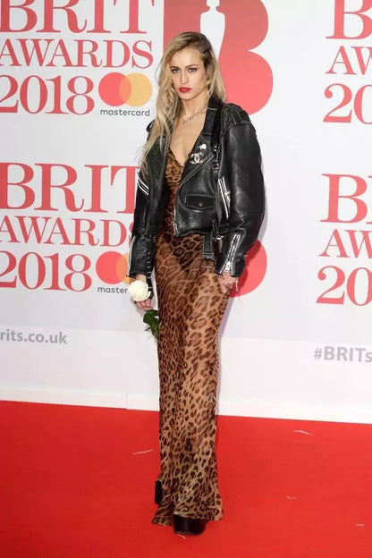 A woman in a leopard print dress on the red carpet at the brit awards 2018.
