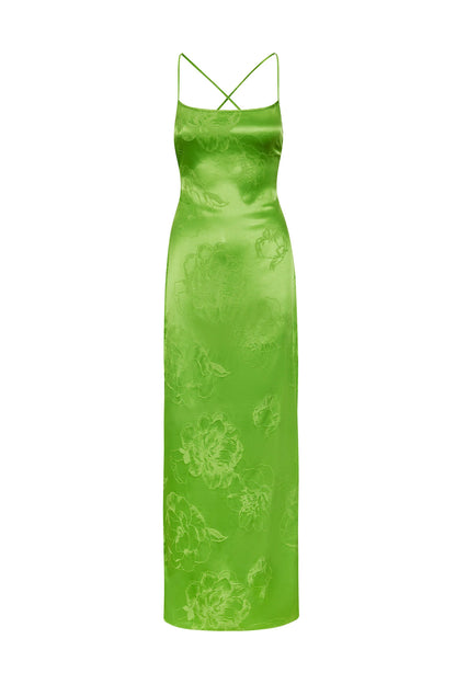 A green satin slip dress with a floral pattern.
