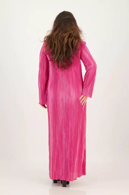  A woman in a Rosey & Vittori long Pink Maxi Dress