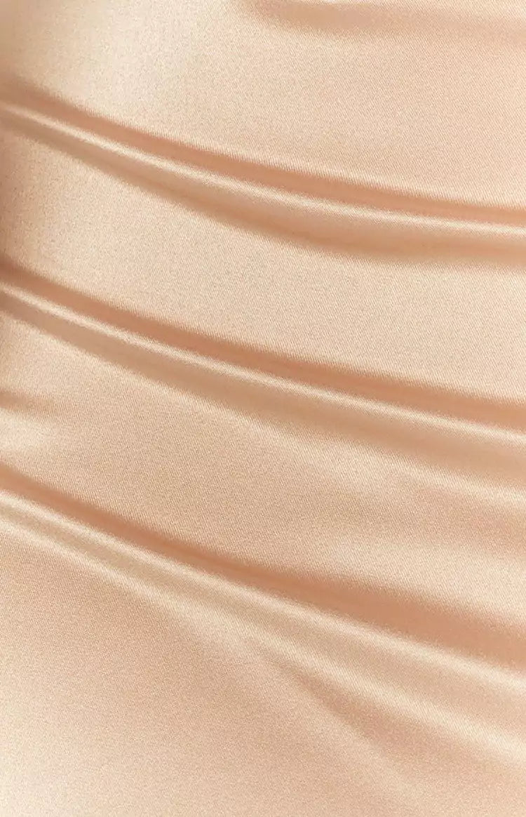 A close up of a woman's dress with Shimmering Lurex Fabric