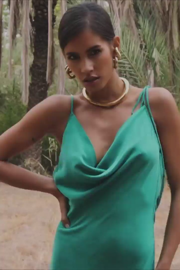 A Woman wearing Tula Emerald Maxi Slip Dressupdated#gid://shopify/Video/22676823179334#video_id