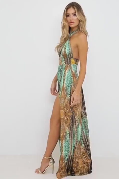 a video view to a lady wear Giada Tiger Print Cross Over Halterneck Maxi brown dressupdated#gid://shopify/Video/22677333966918#video_id
