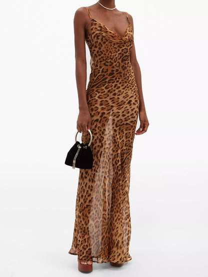 The model is wearing a leopard print dress.