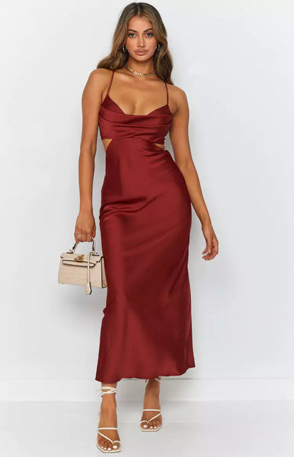 The model is wearing a Zala Red Cut Out Maxi Dress