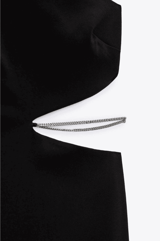 A black dress with a chain attached to it.